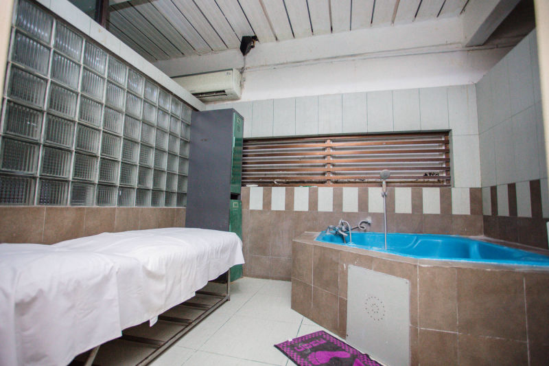 Massage room with bed